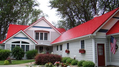 blue house red metal roof|red roof house colour schemes.